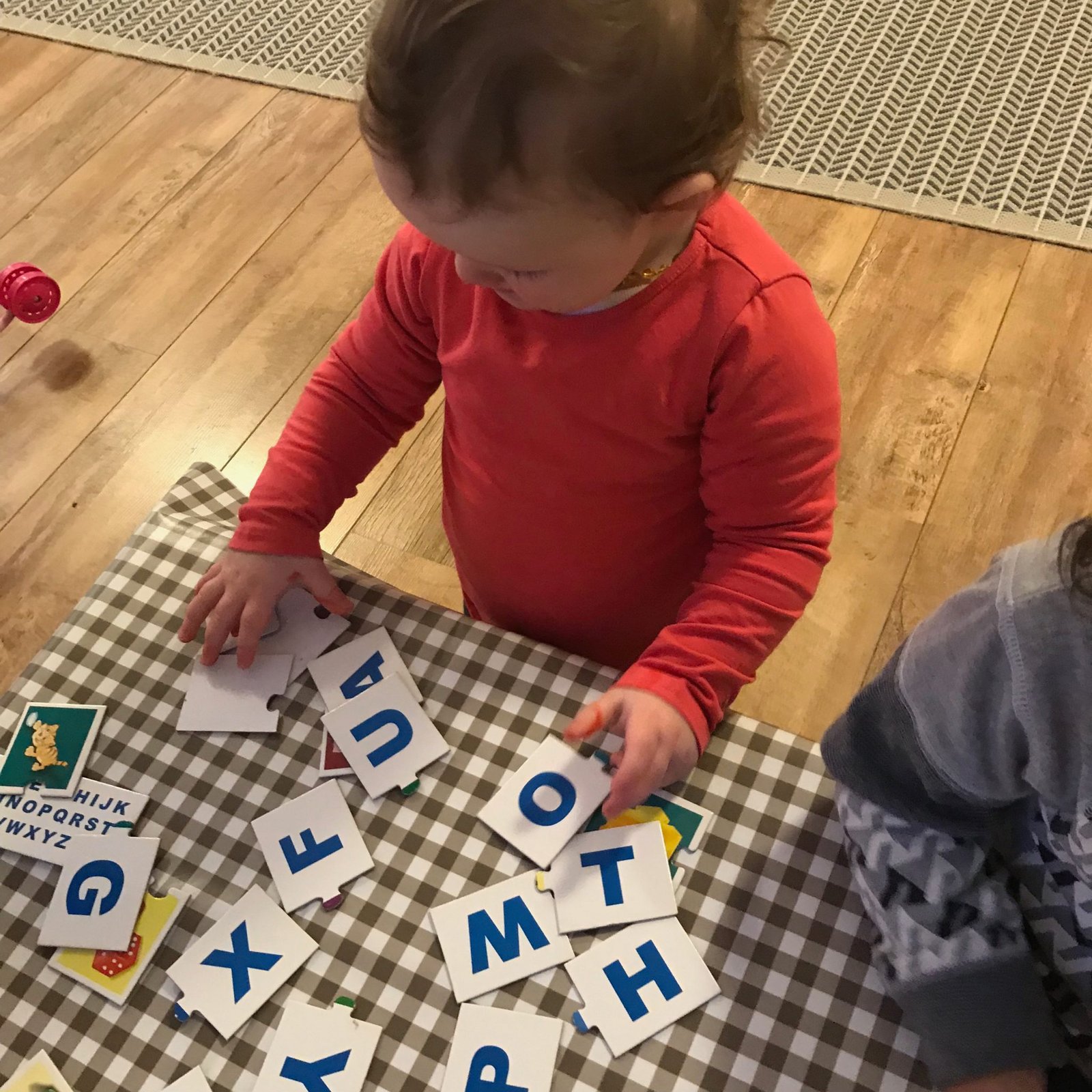 Language in early years A child’s emerging reading and writing skills before they are able to read or write independently for example, scribbling/drawing, identifying, naming and sounding letters.
